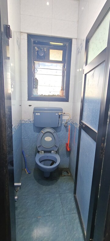 Bathroom in 1 BHK Apartment at Natwardham CHS, Malad West – for Rent