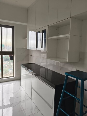 Kitchen in 2 BHK Apartment at Raymond Ten X Habitat, Pokhran Road No Two – for Rent