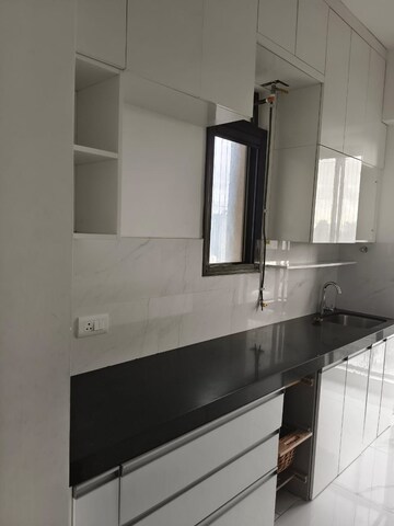 Kitchen in 2 BHK Apartment at Raymond Ten X Habitat, Pokhran Road No Two – for Rent
