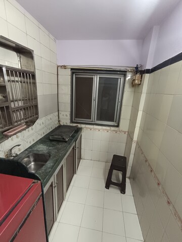Kitchen in 1 RK Apartment at Bindra Complex, Andheri East – for Rent