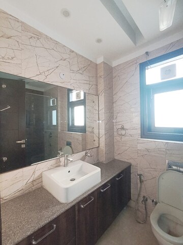 Bathroom in 3 BHK Apartment at Greater Kailash I – for Rent