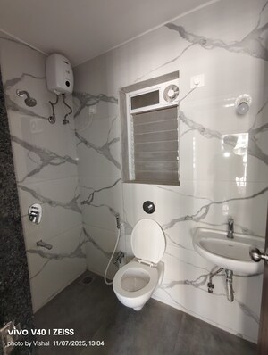 Bathroom in 1 BHK Apartment at Raunak Bliss, Ghodbunder Road – for Rent