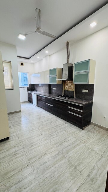 Kitchen in 3 BHK Builder Floor at Ansal Sushant Lok I, Sector 43 – for Sale