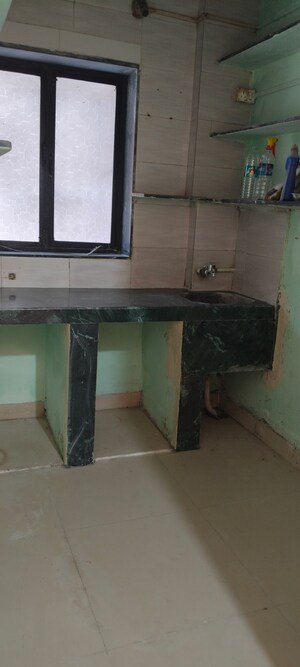 Kitchen in 1 BHK Apartment at Priyadarshini Chs Seawoods, Seawoods – for Rent