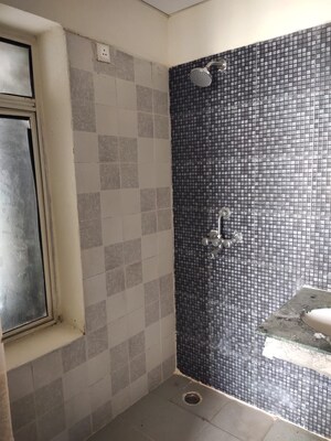 Bathroom in 3 BHK Apartment at Arun Vihar, Sector 29 – for Sale
