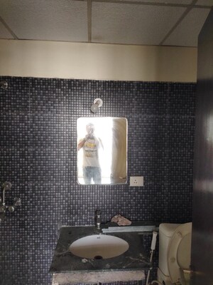 Bathroom in 3 BHK Apartment at Arun Vihar, Sector 29 – for Sale