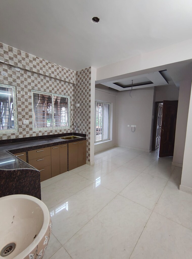 Living Room, sunshine-enclave-new-town 2 Bedroom 981 Sq.Ft. Apartment In New Town Kolkata 9418418