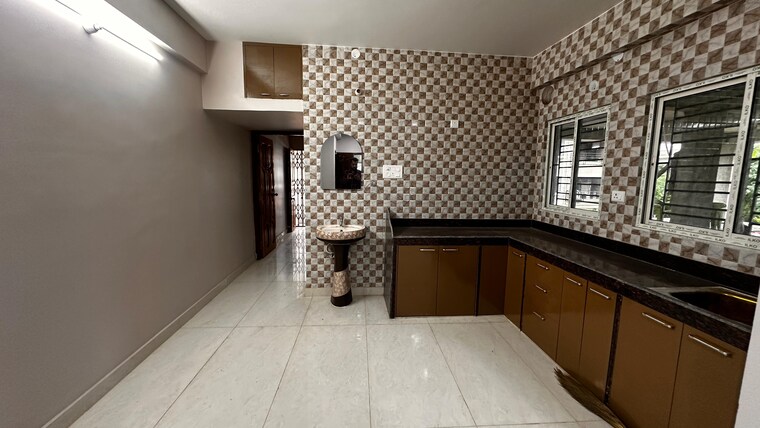 Kitchen, sunshine-enclave-new-town 2 Bedroom 981 Sq.Ft. Apartment In New Town Kolkata 9418418