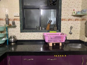 Kitchen in 1 BHK Apartment at Pushpa Parag CHS, Samata Nagar – for Sale