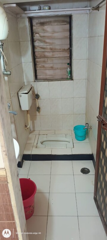 Bathroom in 1 BHK Apartment at AMI Jharna, Goregaon East – for Rent