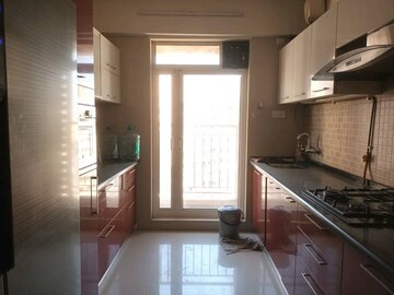 Kitchen in 2 BHK Apartment at Dosti Group Imperia, Manpada – for Rent
