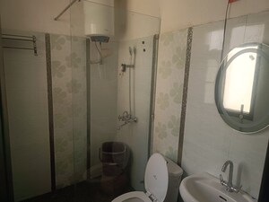 Bathroom in 3 BHK Apartment at Sushma Valencia, International Airport Road – for Rent
