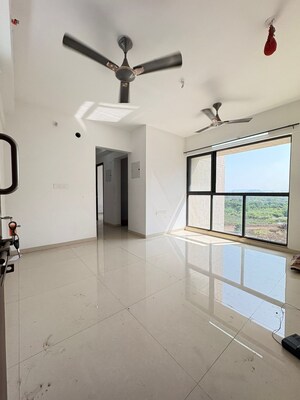 Living Room in 2 BHK Apartment at Lodha Lakeshore Greens, Dombivli East – for Rent