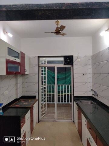 Kitchen in 1 BHK Apartment at Balaji Mesmero, Lohgaon – for Rent
