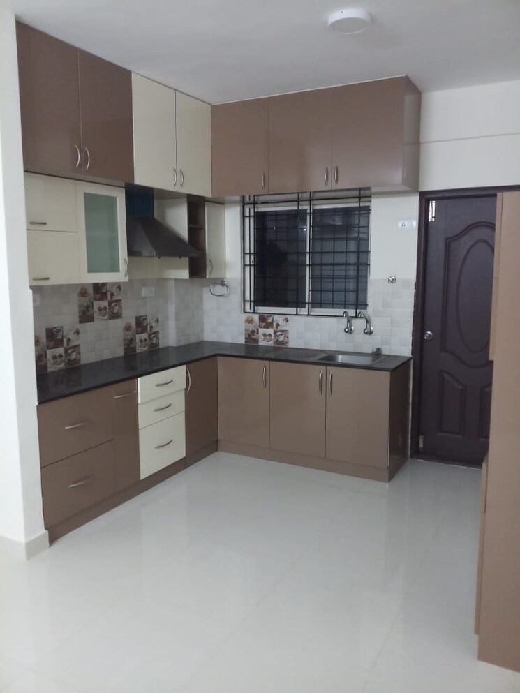 Kitchen, meenakshi-north-avenue 2 Bedroom 1250 Sq.Ft. Apartment In Thanisandra Main Road Bangalore 9418776