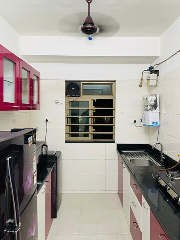 Kitchen in 2 BHK Apartment at Sheth Vasant Oasis, Andheri East – for Rent