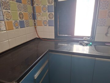 Kitchen in 1 BHK Apartment at Raunak Heights, Ghodbunder Road – for Rent