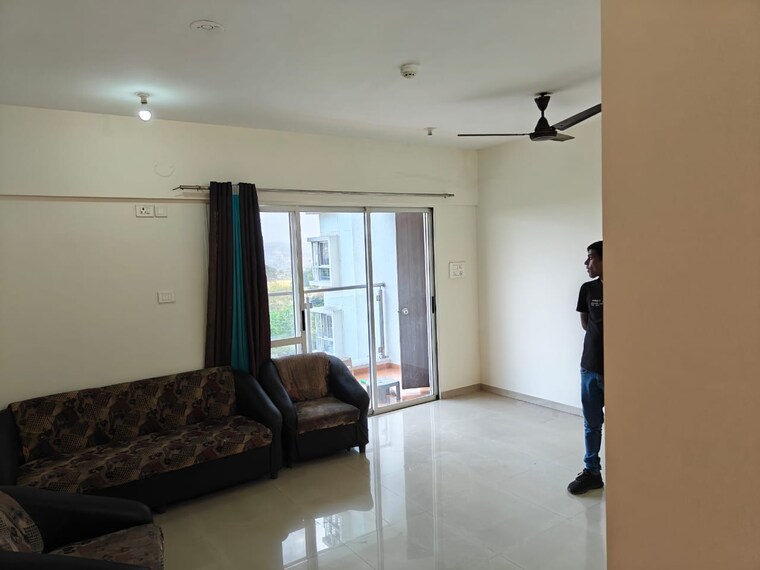 Living Room, the-chatterjee-the-crown-greens 2 Bedroom 1067 Sq.Ft. Apartment In Hinjewadi Pune 9418959