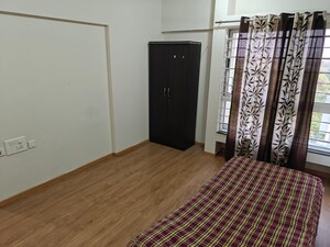 Bedroom in 2 BHK Apartment at The Chatterjee The Crown Greens, Hinjewadi – for Rent