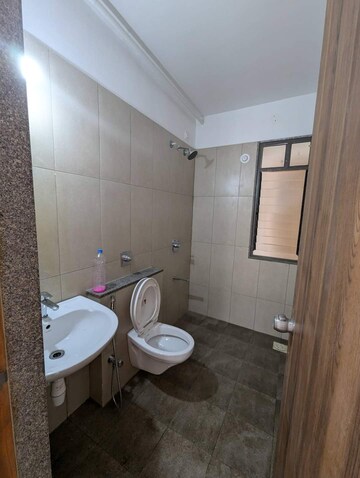 Bathroom in 2 BHK Apartment at Pride World City, Charholi Budruk – for Rent