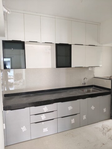 Kitchen in 2.5 BHK Apartment at Kohinoor Viva City, Dhanori – for Rent