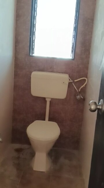 Bathroom in 1 BHK Apartment at Rajgruha Apartment, Khar West – for Sale