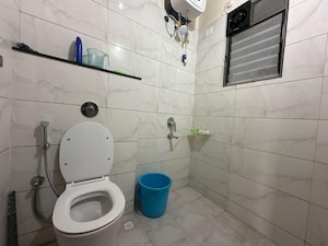 Bathroom in 2 BHK Apartment at Majestique Towers, Kharadi – for Rent