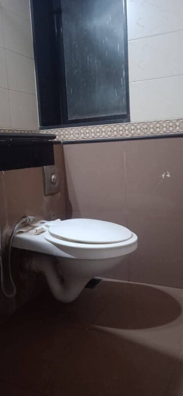 Bathroom in 3 BHK Apartment at Sangam CHS, Goregaon East – for Rent