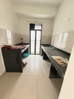 Kitchen in 2 BHK Apartment at Runwal Gardens North Avenue, Dombivli East – for Sale