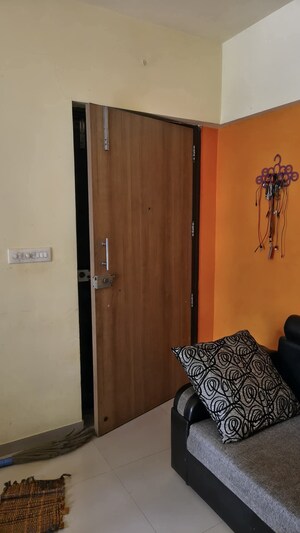 Living Room in 1 BHK Apartment at Casa RioGold, Dombivli East – for Rent