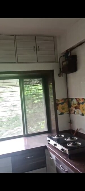 Kitchen in 2 BHK Apartment at Kanika CHS, Andheri East – for Rent