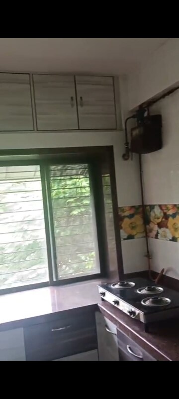 Kitchen in 2 BHK Apartment at Kanika CHS, Andheri East – for Rent
