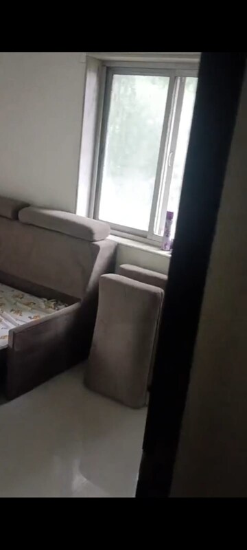 Living Room in 2 BHK Apartment at Kanika CHS, Andheri East – for Rent