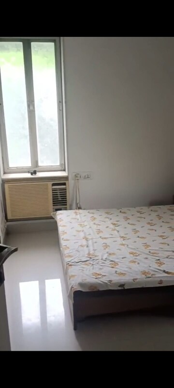 Bedroom in 2 BHK Apartment at Kanika CHS, Andheri East – for Rent