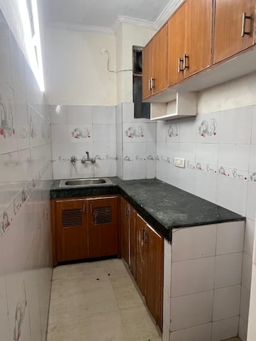 Kitchen in 4 BHK Builder Floor at Defence Colony – for Rent