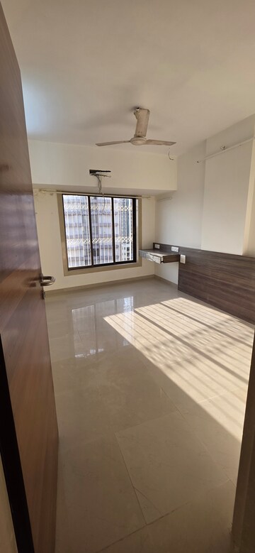 Staircase in 3 BHK Apartment at Vastu Tower, Malad West – for Rent