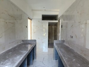 Kitchen in 1 BHK Apartment at Shellproof Gladiolus Tower, Vasai East – for Sale