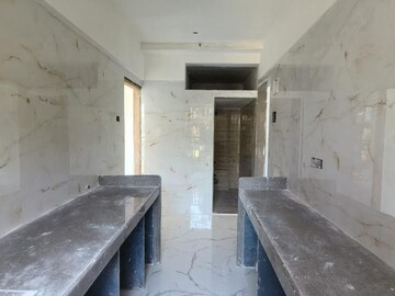 Kitchen in 1 BHK Apartment at Shellproof Gladiolus Tower, Vasai East – for Sale