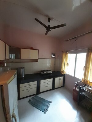 Kitchen in 2 BHK Apartment at Kumar Girija Shankar Vihar, Karve Nagar – for Rent