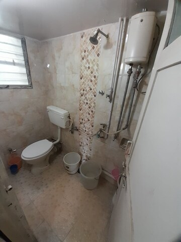 Bathroom in 2 BHK Apartment at Kumar Girija Shankar Vihar, Karve Nagar – for Rent