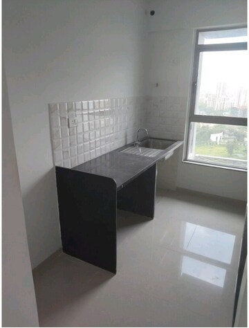 Kitchen in 2 BHK Apartment at Kalpataru Immensa, Kolshet Road – for Rent