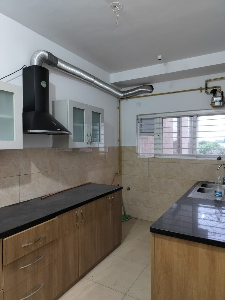 Kitchen, anshika-indira-enclave-i 4 Bedroom 2372 Sq.Ft. Apartment In Indrapuram Ghaziabad 9419723