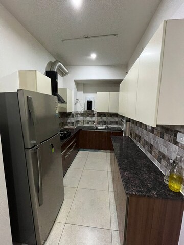 Kitchen in 2 BHK Apartment at Maya Garden City, Lohgarh – for Rent