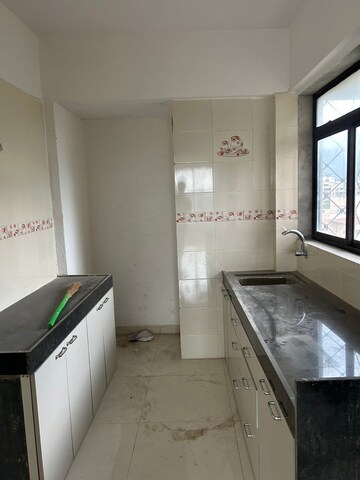 Kitchen in 3 BHK Apartment at Vijay Annex 3, Waghbil – for Rent