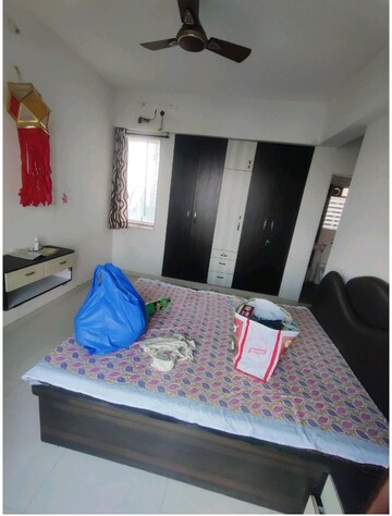 Bedroom in 2 BHK Apartment at Vijay Galaxy, Waghbil – for Rent