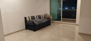 Living Room in 2 BHK Apartment at Aurum Q Residences, Ghansoli – for Rent