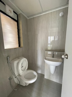Bathroom in 1.5 BHK Apartment at Runwal Gardens, Dombivli East – for Rent