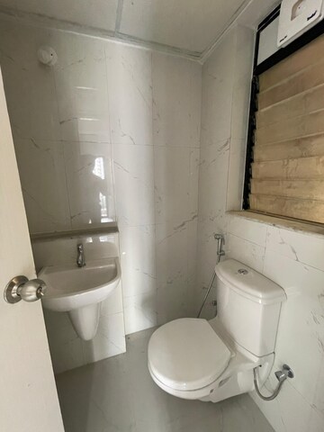 Bathroom in 1.5 BHK Apartment at Runwal Gardens, Dombivli East – for Rent