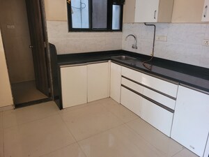 Kitchen in 3 BHK Apartment at Galaxy Parijat, Bhosale Nagar – for Rent