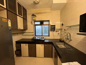 Kitchen in 2 BHK Apartment at Raval Tower Andheri, Andheri West – for Rent